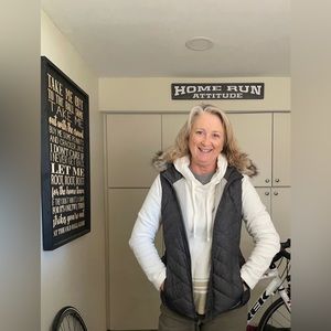 Eddie Bauer Charcoal Small down vest, FauxFur hood, longer in back.